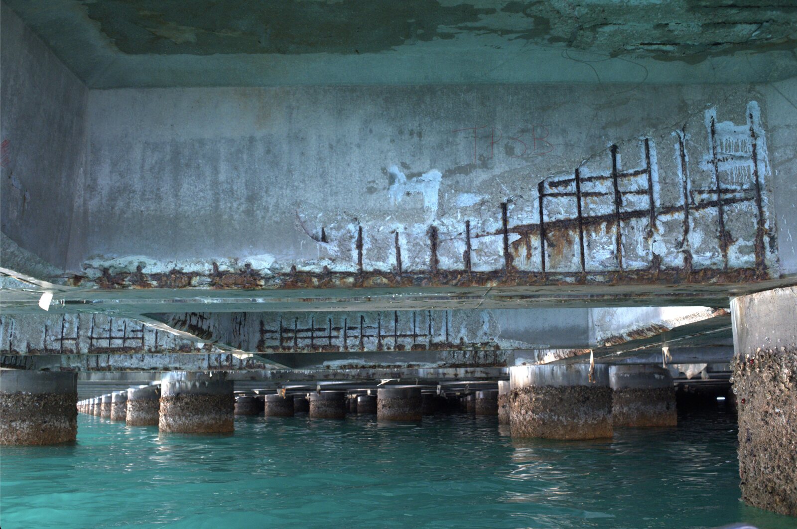 Under the pier, where the inspection work happens